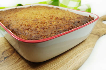 Kugelis or baked potato pudding made from grated potatoes, eggs, onion, bacon and milk. Traditional Lithuanian cuisineの写真素材