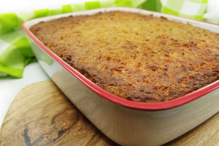 Kugelis or baked potato pudding made from grated potatoes, eggs, onion, bacon and milk. Traditional Lithuanian cuisineの写真素材