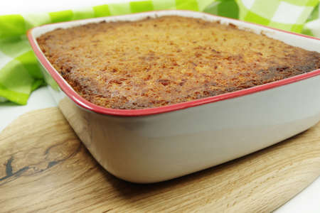 Kugelis or baked potato pudding made from grated potatoes, eggs, onion, bacon and milk. Traditional Lithuanian cuisineの写真素材