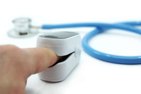 Pulse oximeter isolated on whiteの写真素材