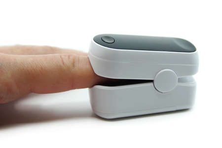 Pulse oximeter isolated on whiteの写真素材