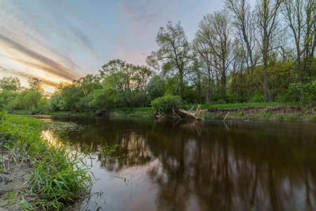 Wonderful colorful evening by the Dubysa river in Lithuania.