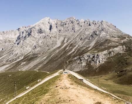 Road along the mountains on a clear day.の写真素材
