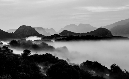 Mist is formed amidst the Mountain Landscape.の写真素材