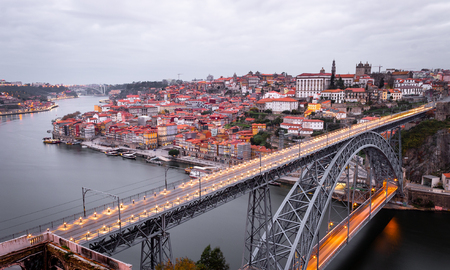 Panorama of Porto, Portugal, with the D. Luis Bridge in the foreground, during a cloudy morning. Long Exposure.の写真素材
