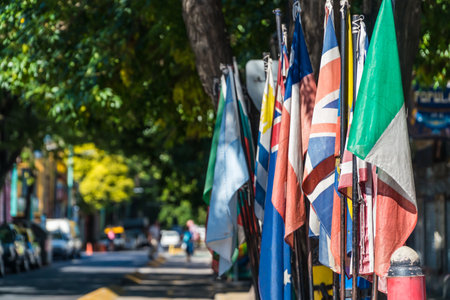 Flags of the several countries in a row on the street in the city of Buenos Aires, Argentinaの写真素材