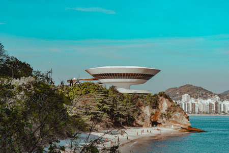NiterÃ³i, Rio de Janeiro, Brazil - CIRCA 2021: The Museum of Contemporary Art in NiterÃ³i was designed by Oscar Niemeyer. Voted one of the 10 most influential works of architecture in the last 50 yearsのeditorial素材