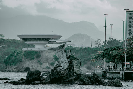 NiterÃ³i, Rio de Janeiro, Brazil - CIRCA 2021: The Museum of Contemporary Art in NiterÃ³i was designed by Oscar Niemeyer. Voted one of the 10 most influential works of architecture in the last 50 yearsのeditorial素材