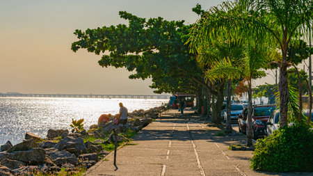 Rio de Janeiro, Brazil - CIRCA 2021: Coastal region of ocean beach during the day with sea, sand and rocksのeditorial素材