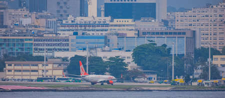 Rio de Janeiro, Brazil - CIRCA 2020: Brazilian commercial plane taxiing on the runway at Santos Dumont national airportのeditorial素材