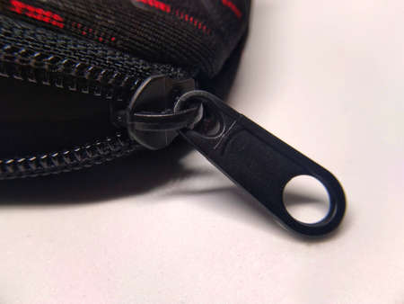 photo of a black wallet on a white backgroundの写真素材