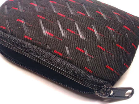 photo of a black wallet on a white backgroundの写真素材