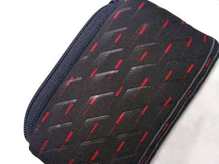 photo of a black wallet on a white backgroundの写真素材