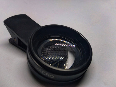 photo of cellphone camera lens on a white backgroundの写真素材