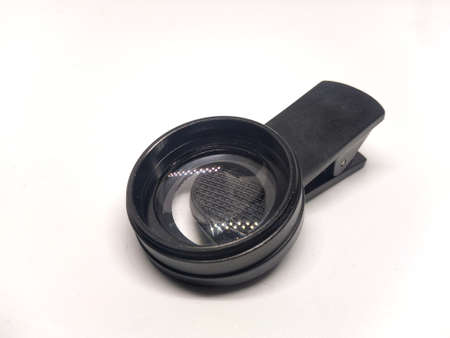 photo of cellphone camera lens on a white backgroundの写真素材