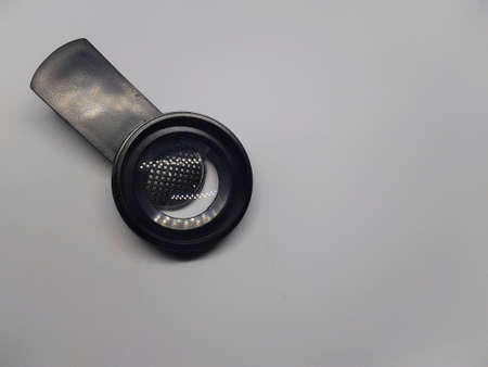 photo of cellphone camera lens on a white backgroundの写真素材