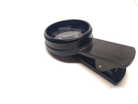 photo of cellphone camera lens on a white backgroundの写真素材