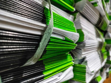 photo books neatly arranged on the storage shelfの写真素材