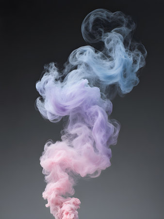 Colorful smoke isolated on gray background. Abstract colored cloud of smokeの素材