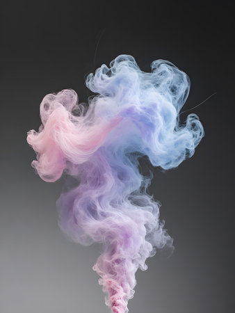 Colorful smoke isolated on gray background. Abstract colored cloud of smokeの素材