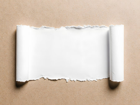Torn paper with space for your message on old paper background.の素材