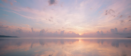 Beautiful sunset over the sea. Panoramic view of the sea at sunset.の素材