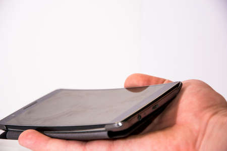 Mobile phone on handの写真素材