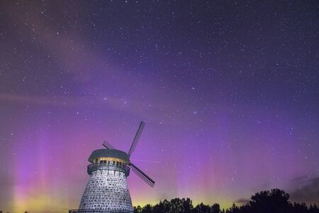 A little bit of northern lights over a windmill