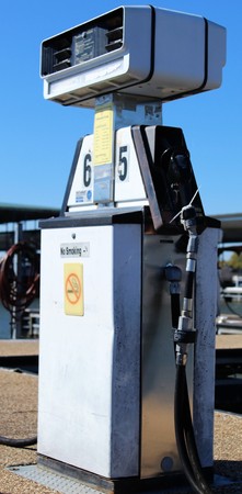 Vintage gas pump at marinaの写真素材