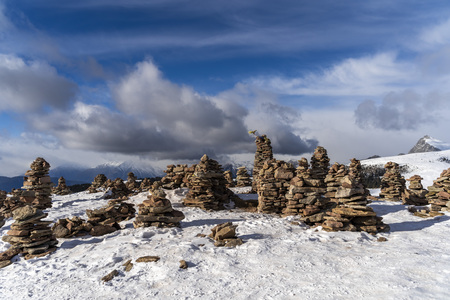 beautiful landcape view of the stoanerne mandln in South Tyrol, sarntal, jenesien during winter with snowの写真素材
