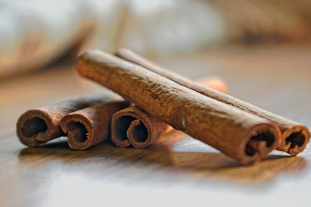 Cinnamon sticks on a wooden tableの写真素材