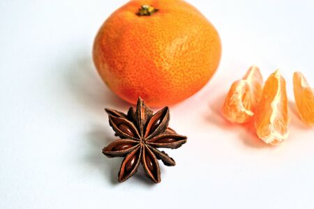 Tangerines and anise on a white backgroundの写真素材