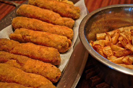 Fried stuffed Karadjordje schnitzel and french friesの写真素材
