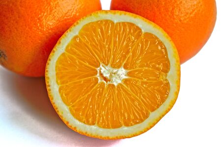Closeup of oranges on a white backgroundの写真素材