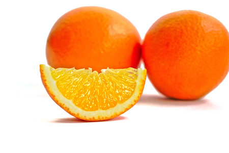 Closeup of oranges on a white backgroundの写真素材