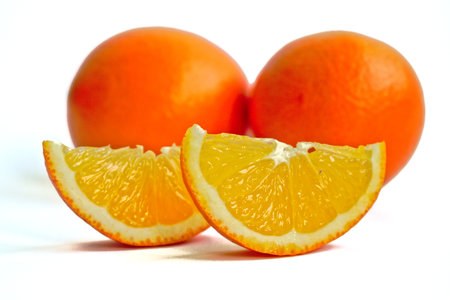 Closeup of oranges on a white backgroundの写真素材