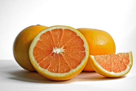 Closeup of grapefruits on a white backgroundの写真素材