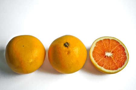 Closeup of grapefruits on a white backgroundの写真素材