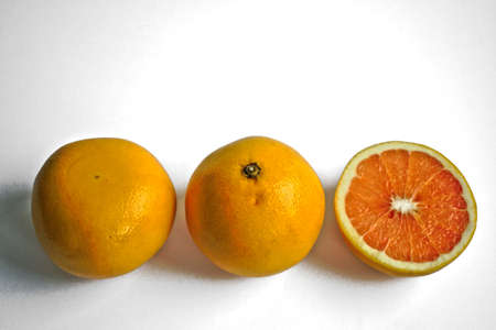 Closeup of grapefruits on a white backgroundの写真素材