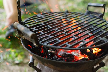 Closeup of fire from a BBQ grillの写真素材