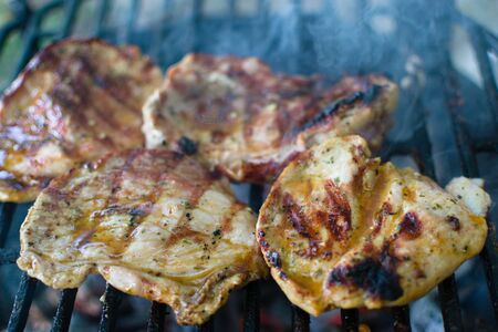 closeup of pork steak on the grillの写真素材