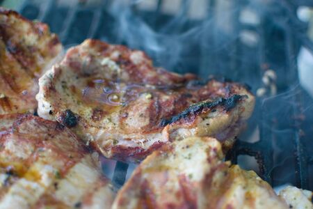 closeup of pork steak on the grillの写真素材