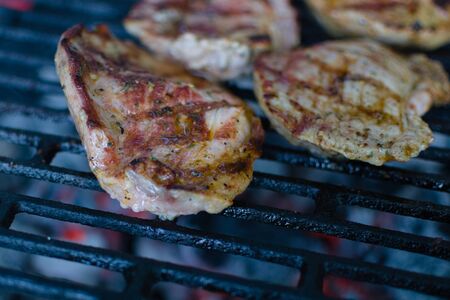 closeup of pork steak on the grillの写真素材