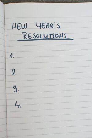 List of new year's resolutions in a notebookの写真素材