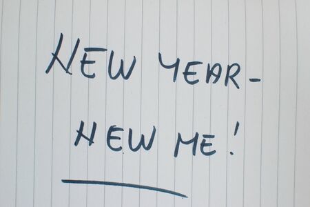 new year new me written in a notebookの写真素材