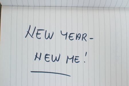 new year new me written in a notebookの写真素材