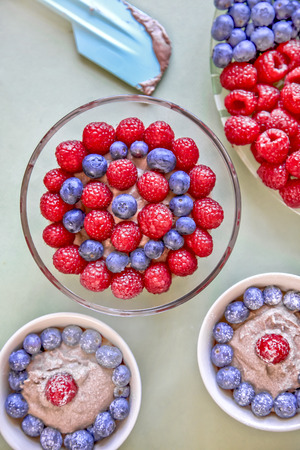 Chocolate dessert served with raspberries and blueberries,の写真素材