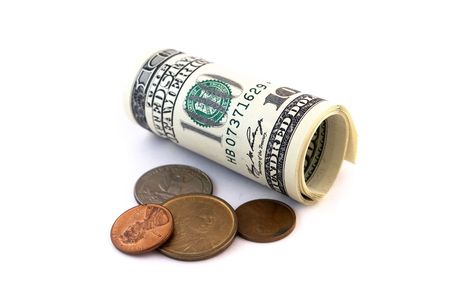 US banknotes and coins isolated against white backgroundの写真素材