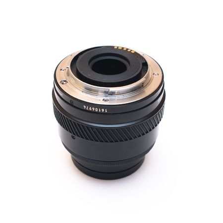Black camera lens isolated in white background
