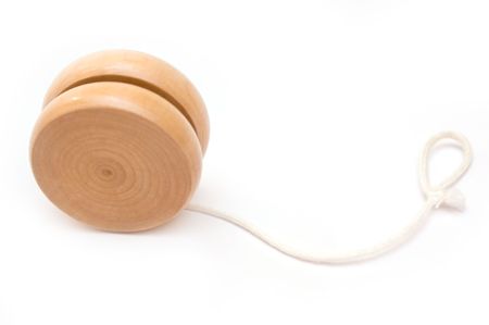 Wooden yo-yo toy isolated on whiteの写真素材
